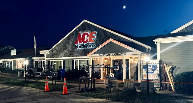 Nighttime view of the Eastham Hardware store, an Ace Hardware franchise location in Eastham, Massachusetts, with illuminated signage and storefront. Multi-location marketing questions: what counts as one location, and who runs it