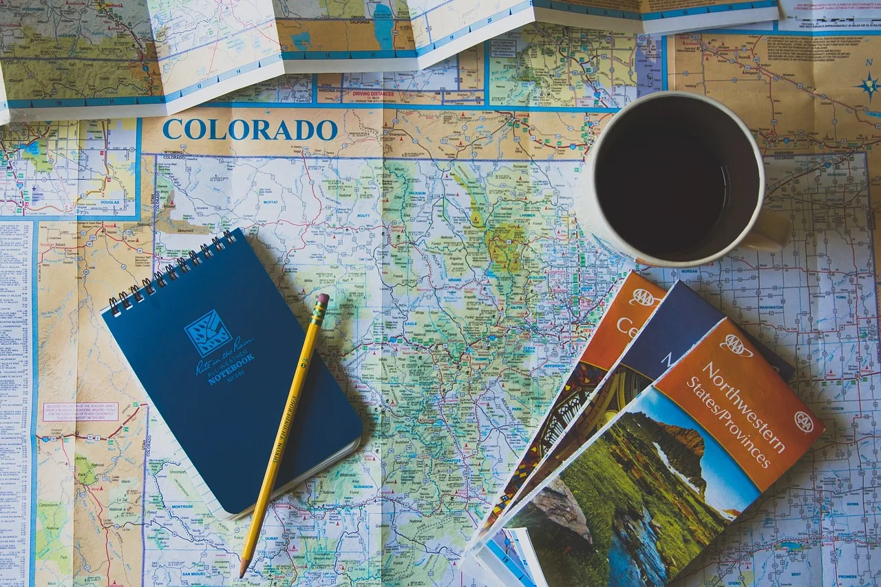 geography, world map, world, map, paper, brochure, notebook, pen, coffee, travel. Franchise SEO explained for business teams in 2027