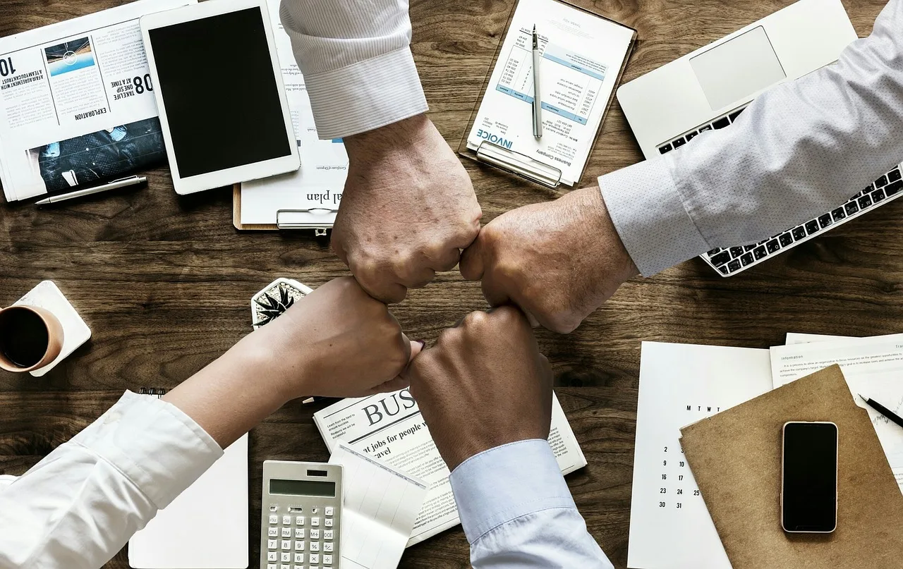 teamwork, cooperation, brainstorming, business, finance, office, team, partners, flat lay, meeting, collaboration, corporation, management, support, team building, unity, teamwork, business, business, business, business, business, office, office, team, team, meeting. Local franchise marketing in 2027: five hypotheses, one on distributed execution