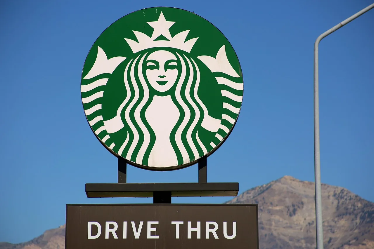 starbucks, coffee, green, white, logo, drive thru, road sign, blue coffee, blue logo, starbucks, drive thru, drive thru, drive thru, drive thru, drive thru. Durable location IDs for franchise marketing and territory records
